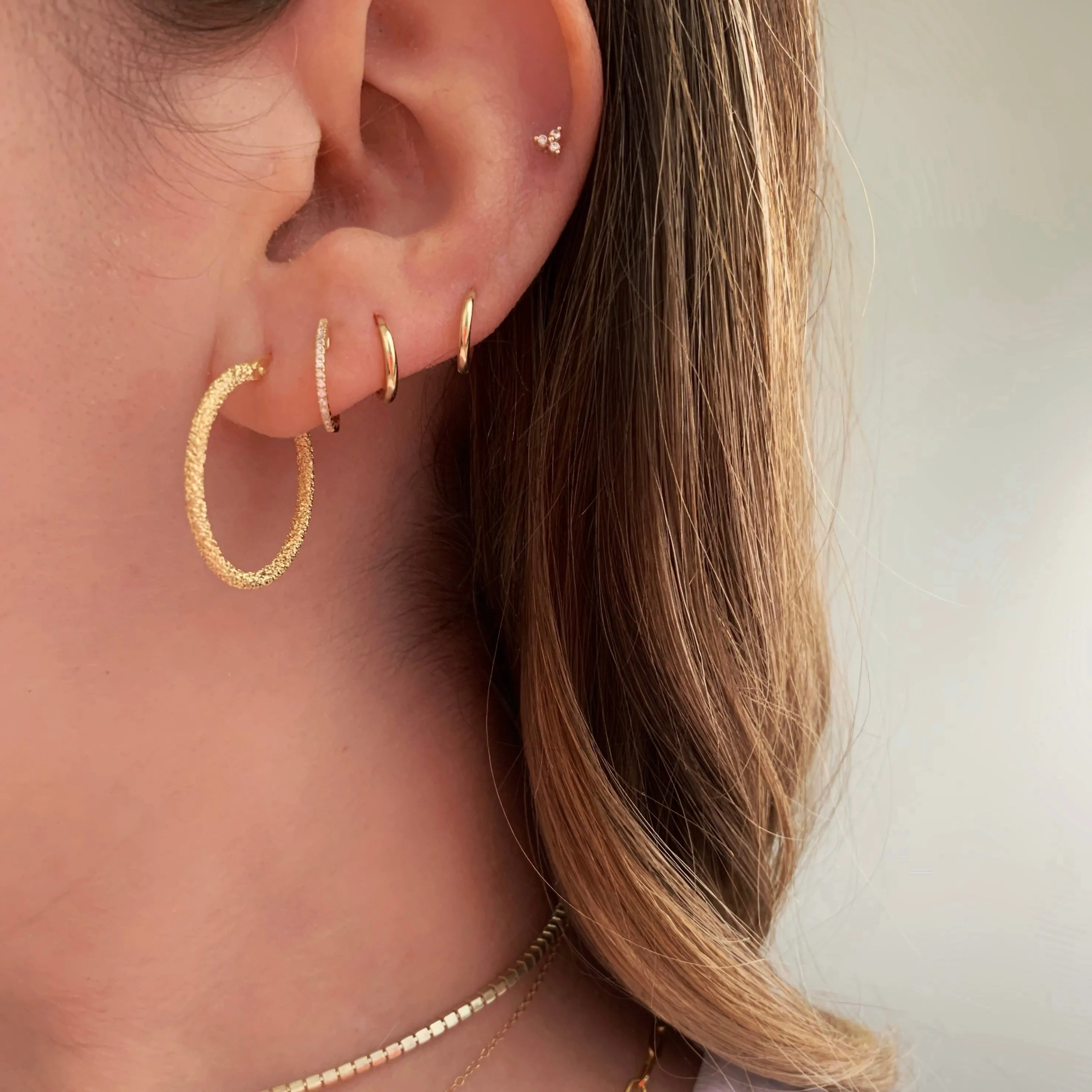 10K Gold Mini Huggie Earrings