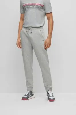 Cotton-blend tracksuit bottoms with embroidered logos 