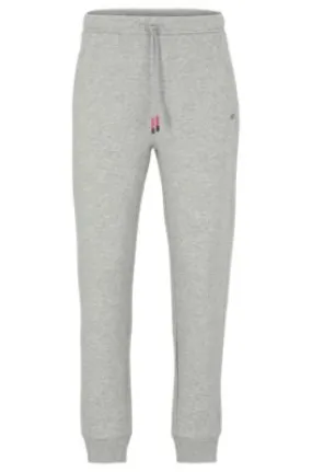 Cotton-blend tracksuit bottoms with embroidered logos 