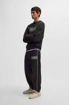 Cotton-terry tracksuit bottoms with chain-stitch logo