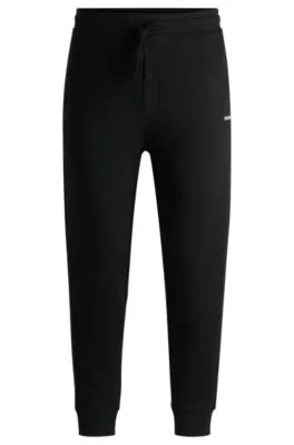 Cotton-terry tracksuit bottoms with logo print