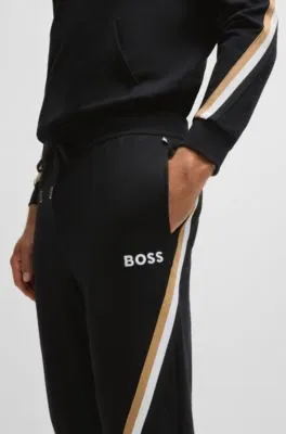 Cotton-terry tracksuit bottoms with signature-stripe tape