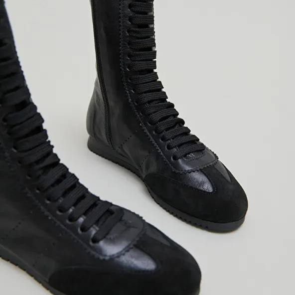 High lace-up sneakers in black suede and black leather