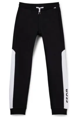 Kids' color-block tracksuit bottoms with logo print