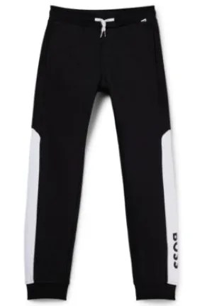 Kids' color-block tracksuit bottoms with logo print