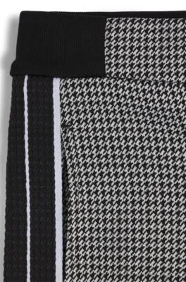 Kids' regular-fit tracksuit bottoms with houndstooth pattern