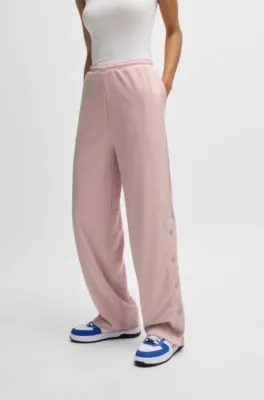 Oversize-fit tracksuit bottoms with logo jacquard