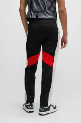 Relaxed-fit tracksuit bottoms with color-blocking