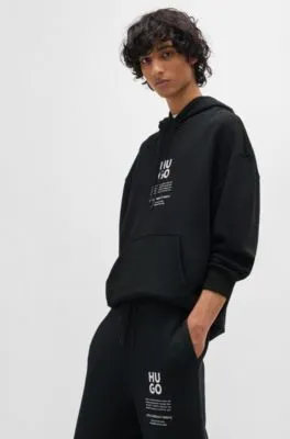 Relaxed-fit tracksuit bottoms with logo and slogans